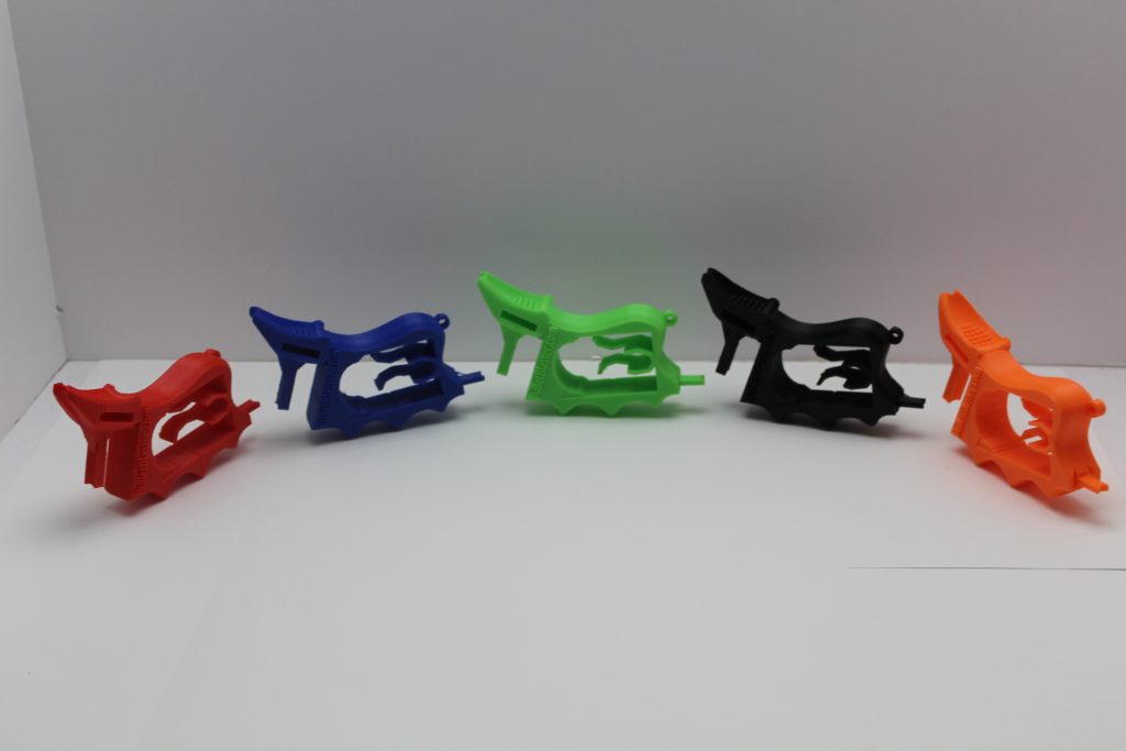 BulletBlaster magazine loaders in red, blue, green, black, and orange